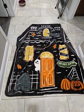Halloween nights haunted house shaped throw blanket